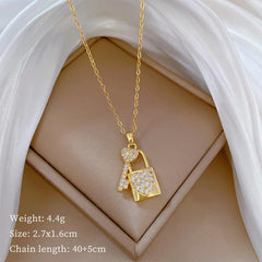Wholesale Titanium Steel Casual Vacation Lock Inlay Artificial Diamond Pendant Necklace - coojewelry