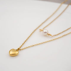 Wholesale Titanium Steel Gold Plated Simple Style Heart Shape Inlay Artificial Pearls Double Layer Necklaces Sweater Chain - coojewelry