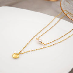 Wholesale Titanium Steel Gold Plated Simple Style Heart Shape Inlay Artificial Pearls Double Layer Necklaces Sweater Chain - coojewelry